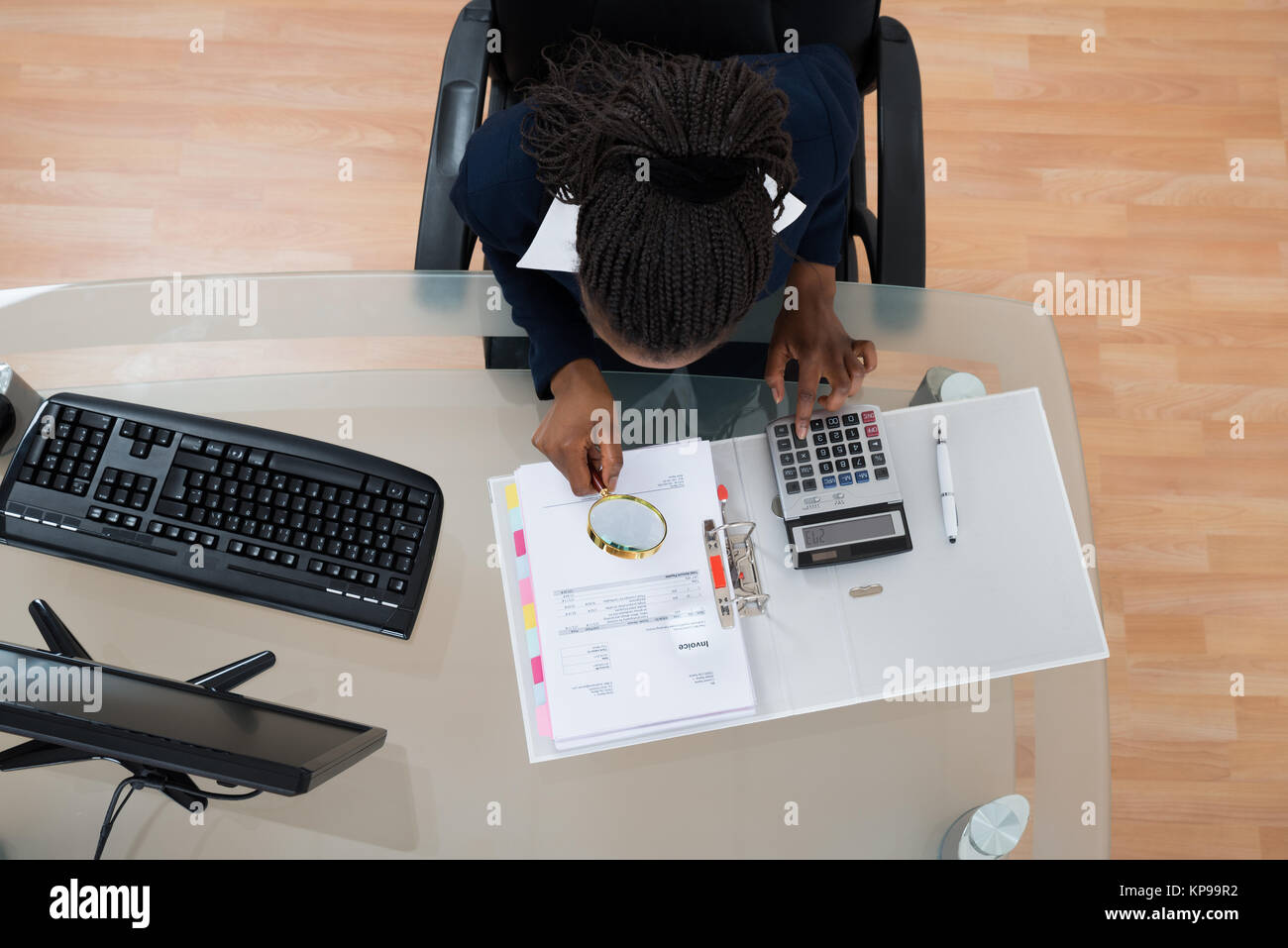 Businesswoman Looking Through Magnifying Glass Stock Photo - Alamy
