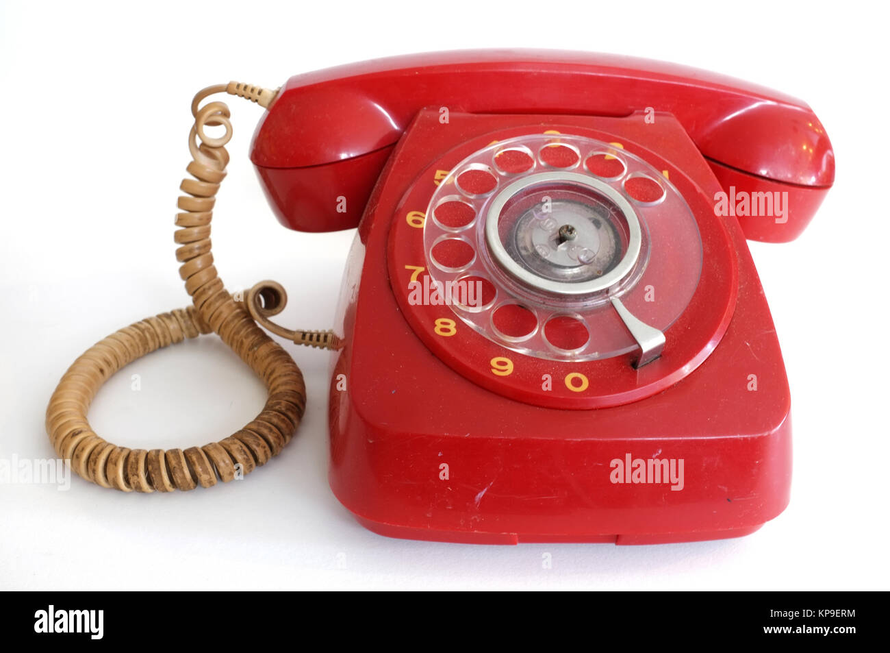 Pink red retro rotary dial telephone Stock Photo