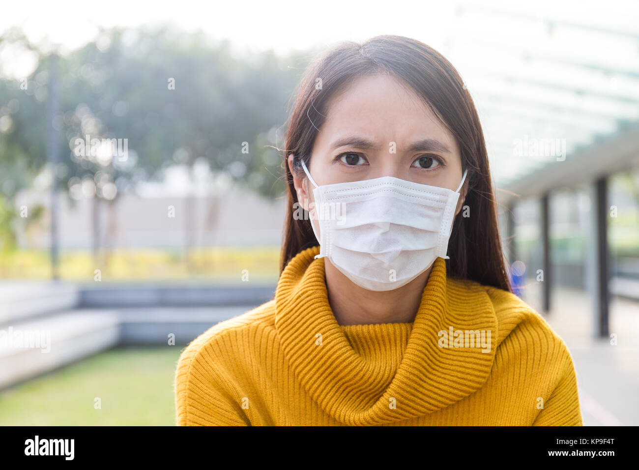 Asian Young woman wearing the face mask for protection Stock Photo - Alamy
