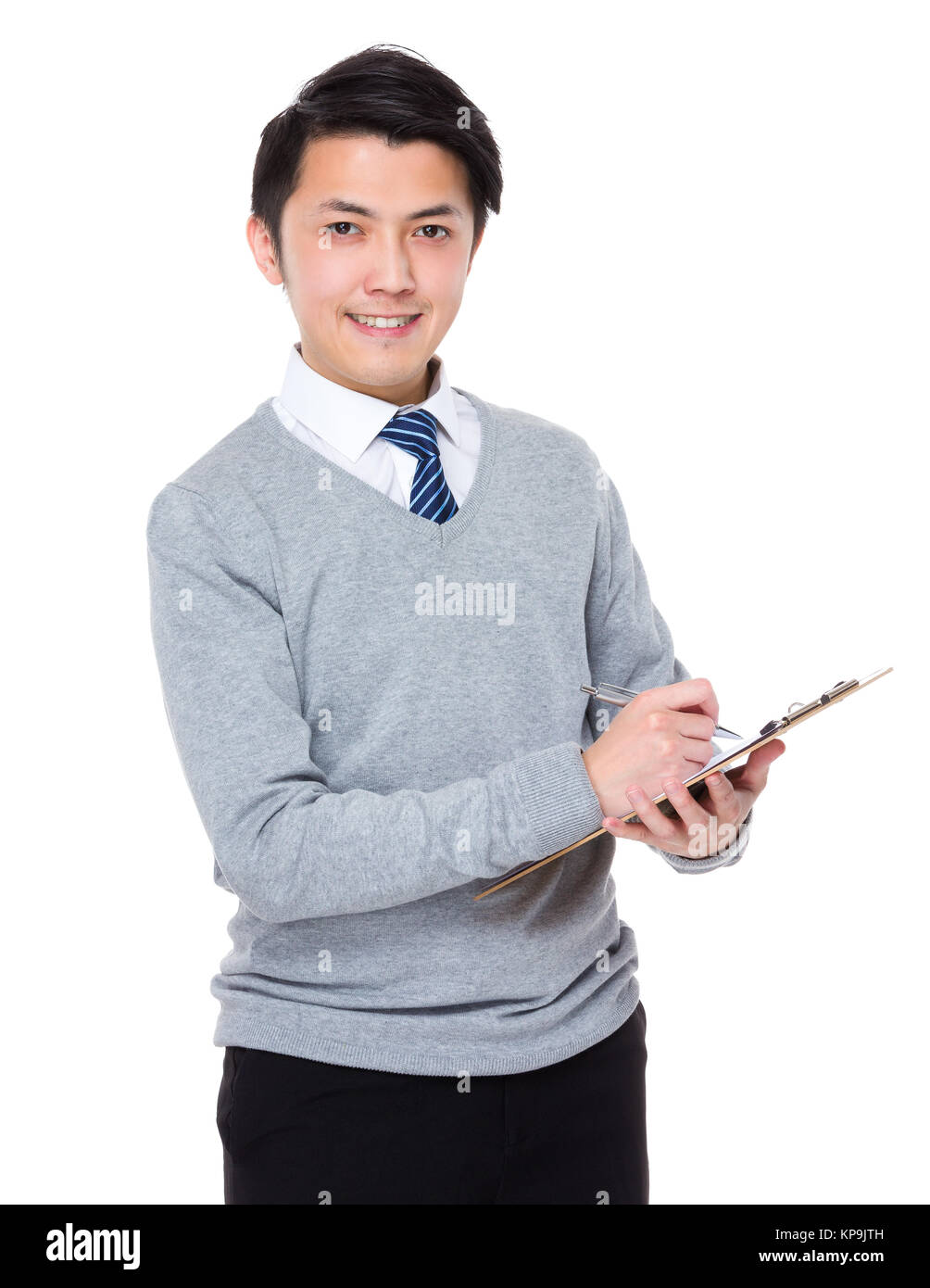 Asian young businessman take note on clipboard Stock Photo - Alamy
