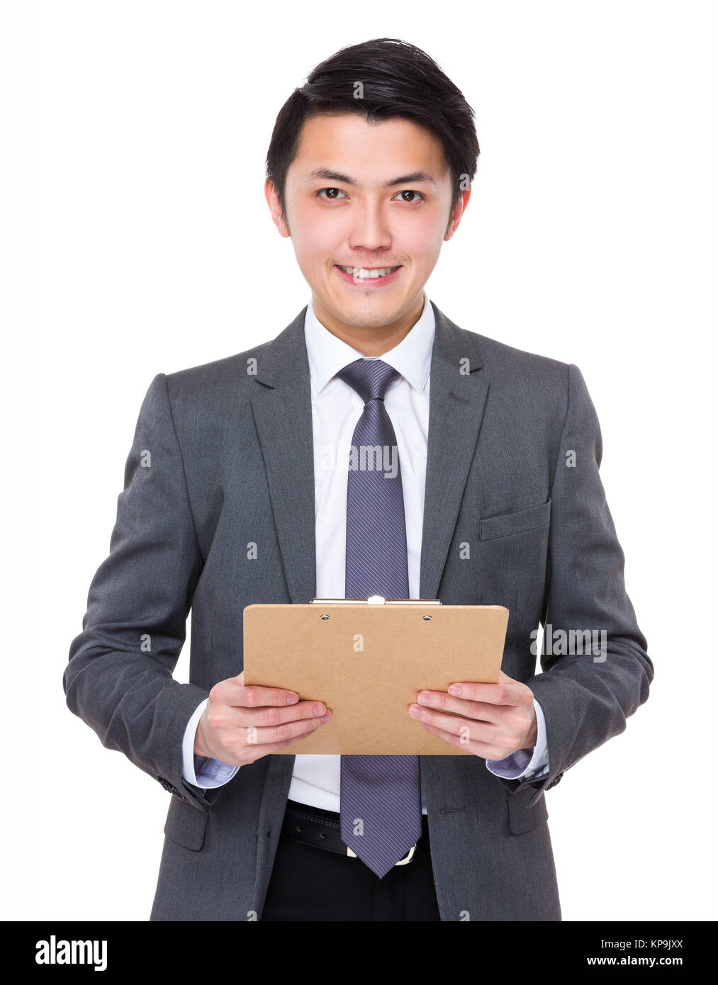 Asian Young businessman hold with clipboard Stock Photo - Alamy