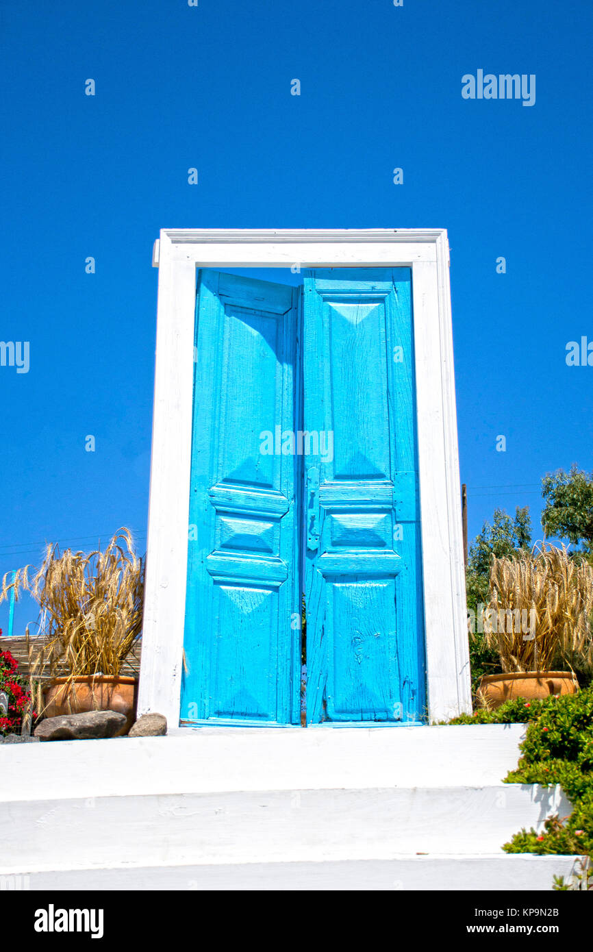 exterior door ajar - blue and white Stock Photo