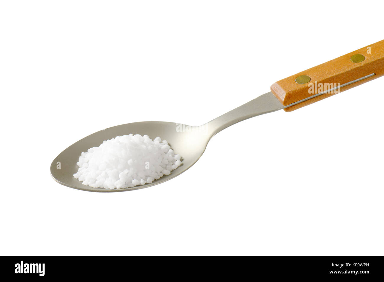 Coarse grained salt on spoon Stock Photo