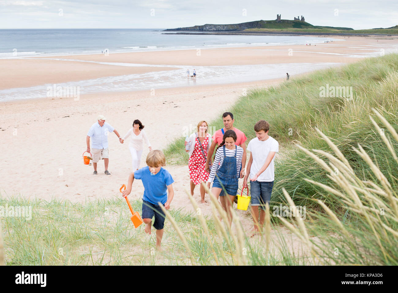 Family leaving the beach Stock Photo
