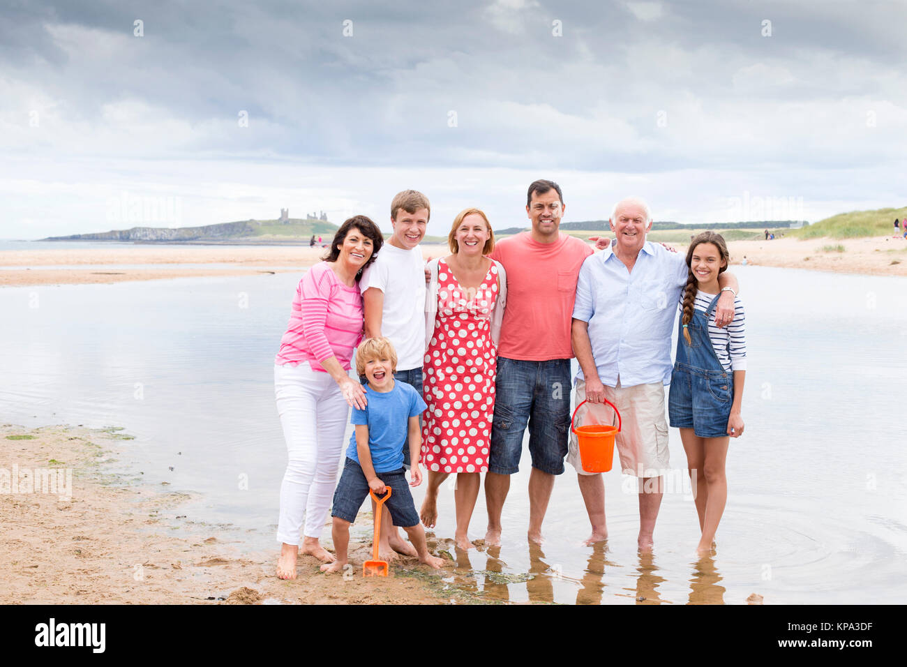 Family at the beach Stock Photo