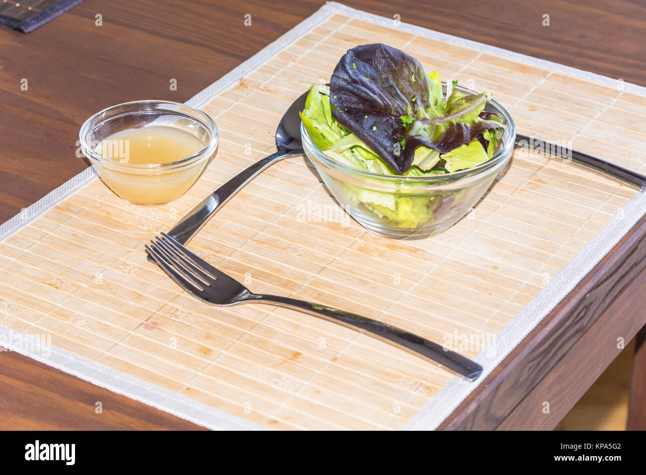a table laid with cutlery Stock Photo