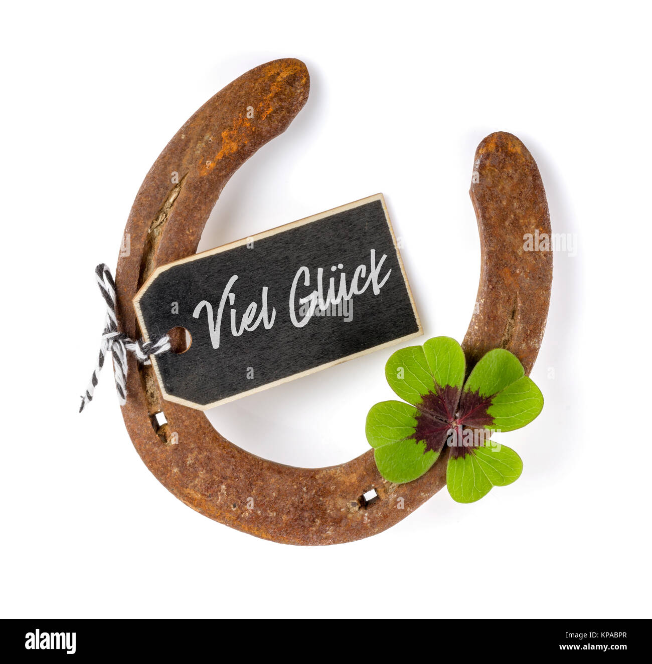 horseshoe with fourleaf clover good luck Stock Photo Alamy