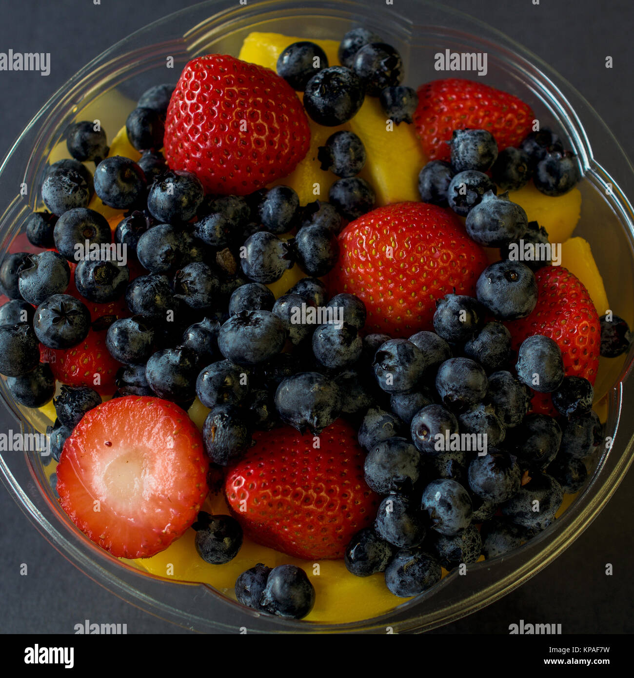 smoothie bowl with mango and berries in mixer Stock Photo - Alamy