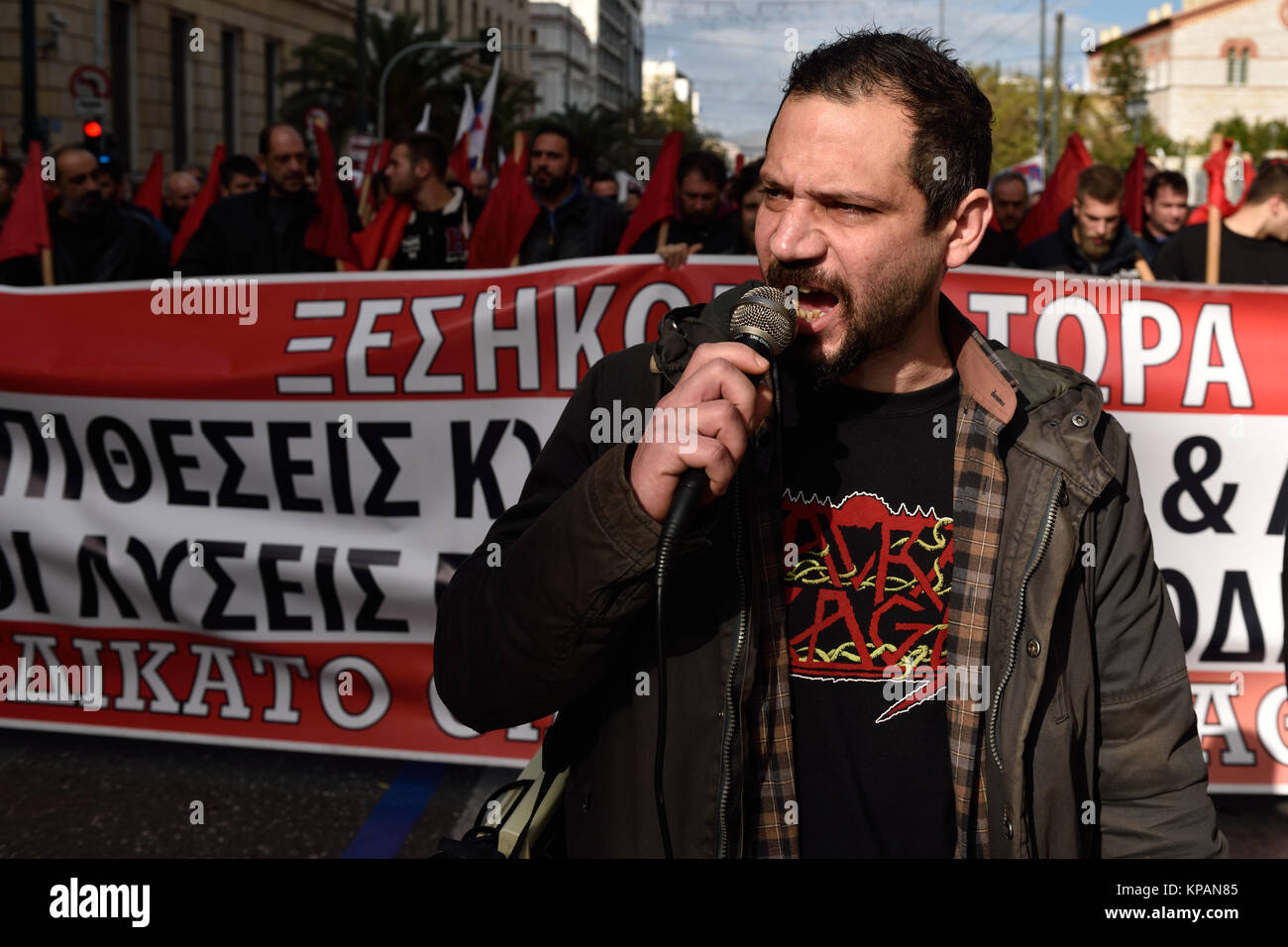 Athens, Greece, 14th December, 2017. Greek Communists march during the 24-hour general strike against the government's austerity policy in Athens, Greece. Credit: Nicolas Koutsokostas/Alamy Live News Stock Photo