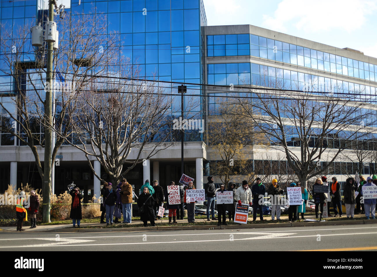 Fairfax, VA, USA. 14th December, 2017. A National Interfaith Clergy Witness takes place outside of the National Rifle Association headquarters on the fifth anniversary of the Sandy Hook Elementary School massacre. The worship service is held both to mourn the victims and call on the NRA and Congress to adopt stricter gun ownership laws. Credit: Nicole Glass / Alamy Live News. Stock Photo