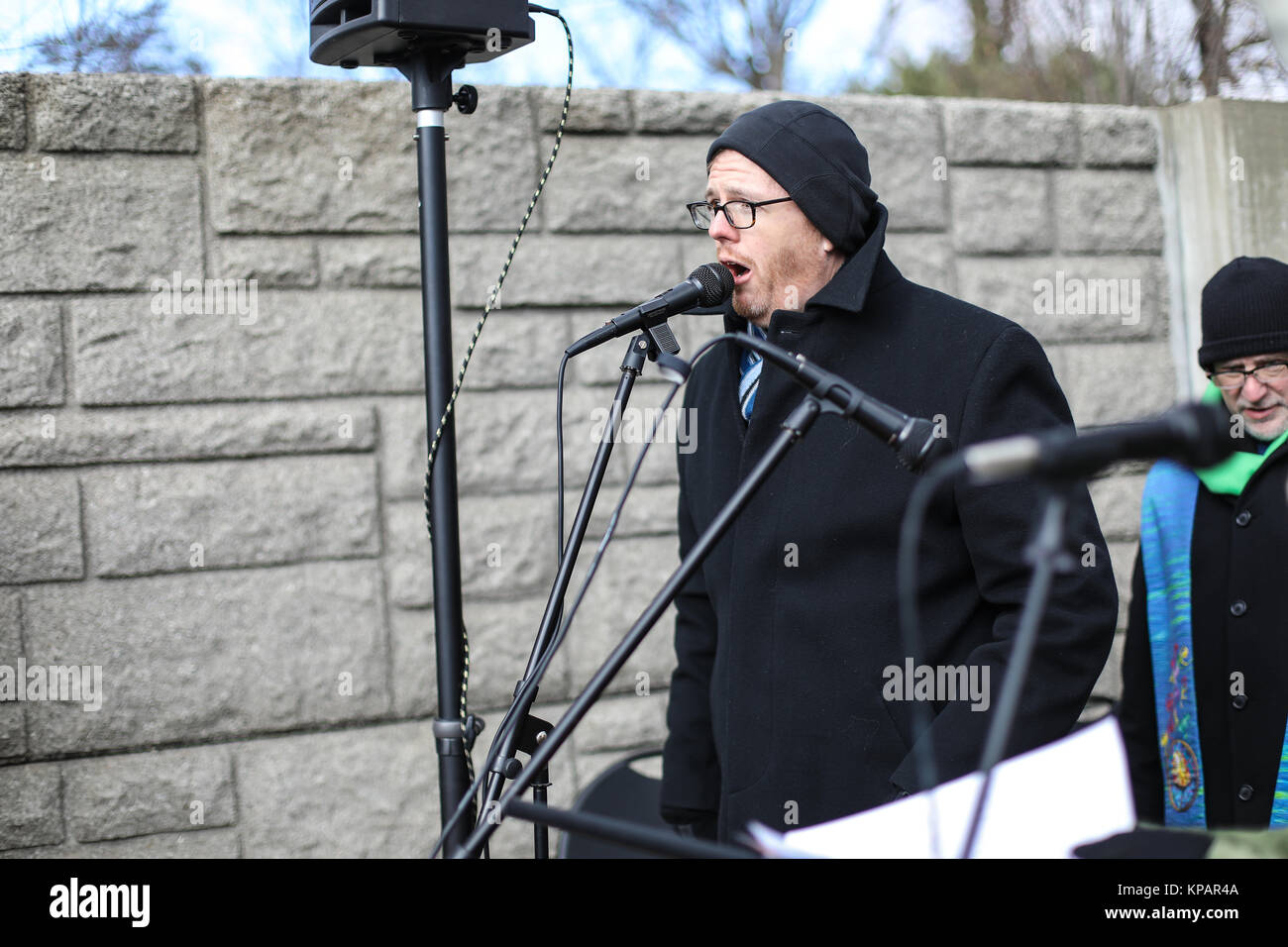 Fairfax, VA, USA. 14th December, 2017. A National Interfaith Clergy Witness takes place outside of the National Rifle Association headquarters on the fifth anniversary of the Sandy Hook Elementary School massacre. The worship service is held both to mourn the victims and call on the NRA and Congress to adopt stricter gun ownership laws. Credit: Nicole Glass / Alamy Live News. Stock Photo