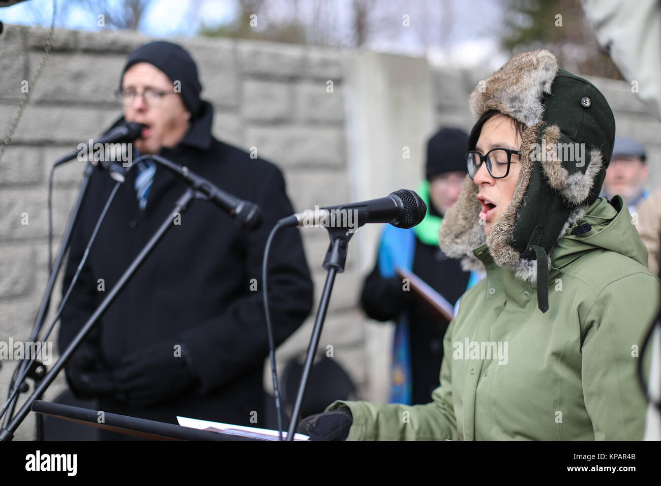 Fairfax, VA, USA. 14th December, 2017. A National Interfaith Clergy Witness takes place outside of the National Rifle Association headquarters on the fifth anniversary of the Sandy Hook Elementary School massacre. The worship service is held both to mourn the victims and call on the NRA and Congress to adopt stricter gun ownership laws. Credit: Nicole Glass / Alamy Live News. Stock Photo