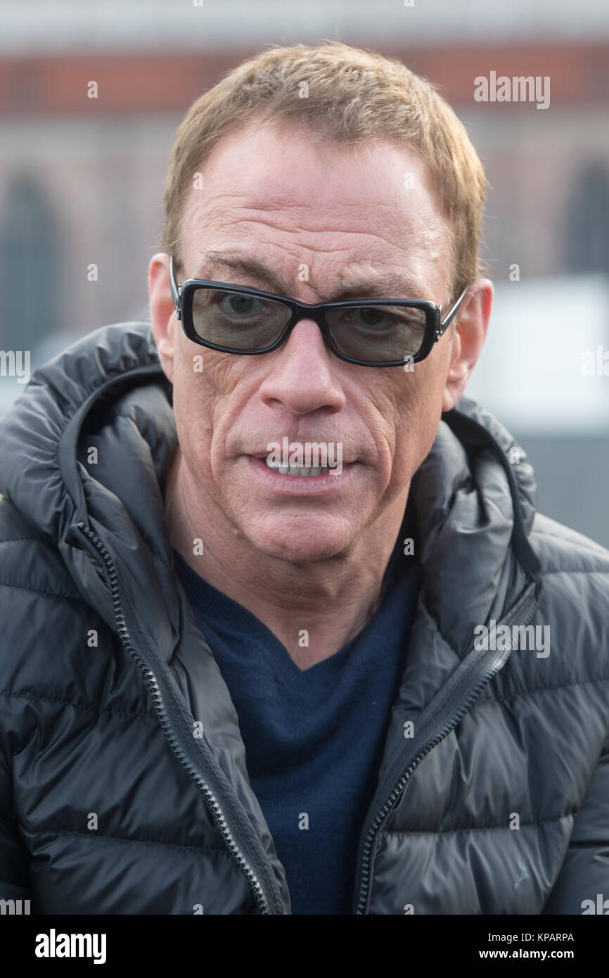 Munich, Germany. 14th December, 2017. Actor Jean-Claude Van Damme wears sunglasses during a press conference in Munich, 14 December 2017. Van Damme is going to play the lead character in Amazon's new series 'Jean-Claude van Johnson'. Photo: Tobias Hase/dpa/Alamy Live News Stock Photo