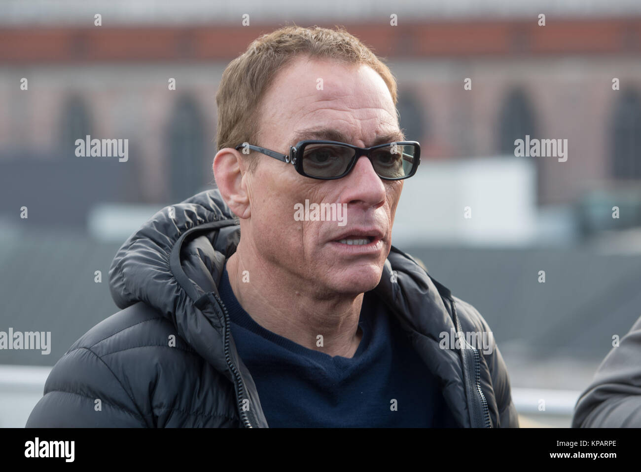 Munich, Germany. 14th December, 2017. Actor Jean-Claude Van Damme wears  sunglasses during a press conference in Munich, 14 December 2017. Van Damme  is going to play the lead character in Amazon's new