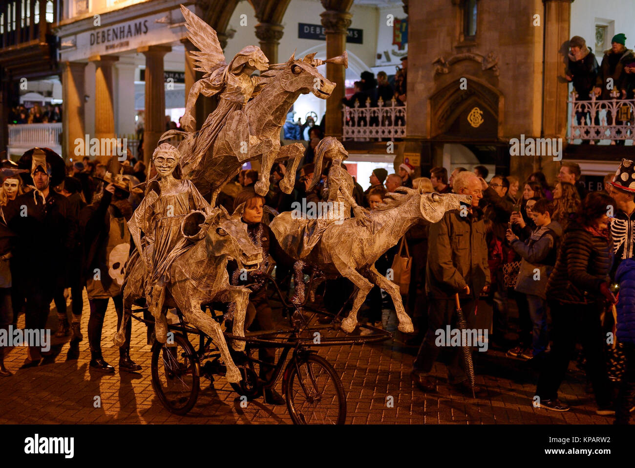 Chester, UK. 14th December 2017. A cyclist takes part in the annual Winter Watch parade through the city centre. The parade involves musicians, street theatre and costume performances with characters including angels, devils, skeletons and dragons. Credit: Andrew Paterson/Alamy Live News Stock Photo