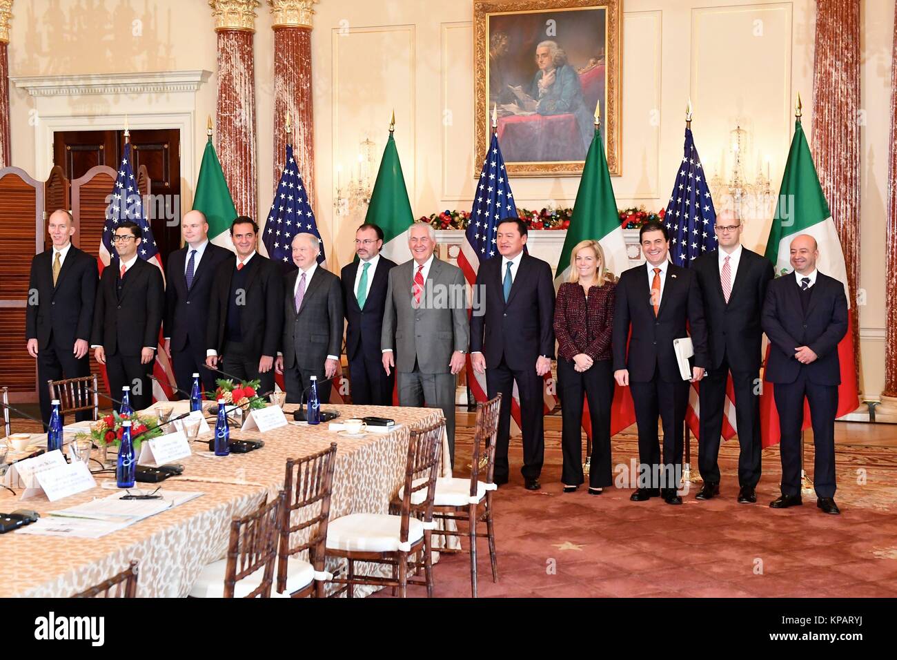 Washington DC, USA. 14th Dec, 2017. U.S. and Mexican officials stand for a group photo before the start of the Second U.S.-Mexico Strategic Dialogue on Disrupting Transnational Criminal Organizations at the State Department December 14, 2017 in Washington, D.C. Included at the meeting are Homeland Security Secretary Kirstjen Nielsen, Attorney General Jeff Sessions and their Mexican counterparts, Foreign Secretary Luis Videgaray, Secretary of Government Miguel Osorio, and Acting Attorney General Elias Beltran. Credit: Planetpix/Alamy Live News Stock Photo