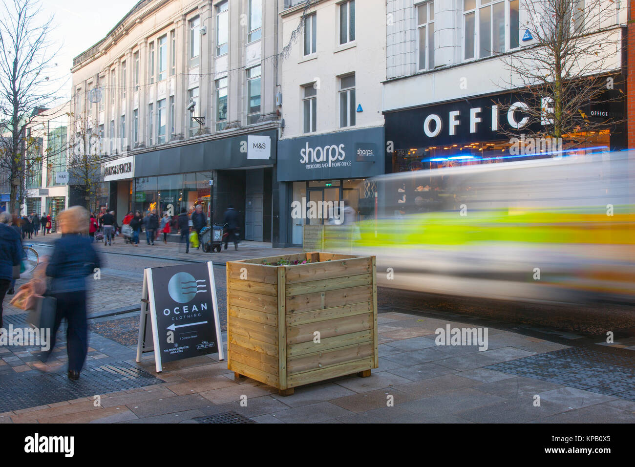 Preston, Lancashire, UK. 15th Dec, 2017. Security Alert. Anti-Terrorist devices, or vehicle buffers have been installed overnight in the cities High Street. Shoppers in Fishergate have now to negotiate around large wooden planters filled with concrete & topped off with winter pansies. The devices designed to thwart a vehicle led attack targeting Christmas shoppers & pedestrians have been greeted with some amusement by residents, variously described as the largest litter bins on the street, an eyesore and a huge obstruction for the visually impaired. Credit: MediaWorldImages/Alamy Live News Stock Photo