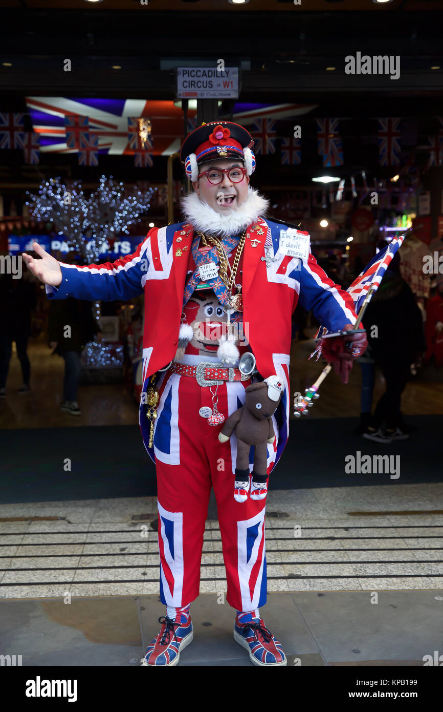 London, UK. 15th Dec, 2017. A man dressed in a Union Jack jumps and ...