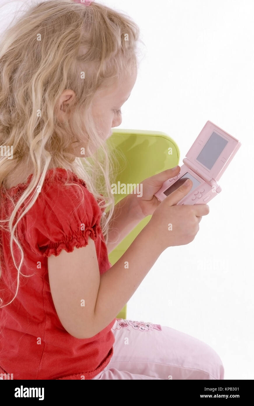 Model release, Maedchen mit Computerspiel - girl with computer game Stock Photo