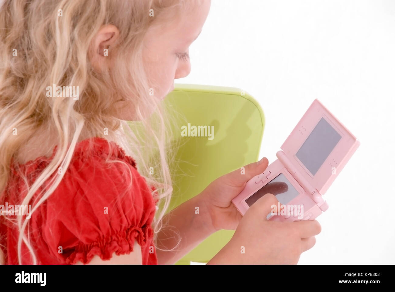Model release, Maedchen mit Computerspiel - girl with computer game Stock Photo