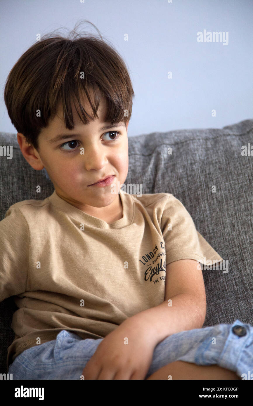 Boy on Couch Stock Photo Alamy