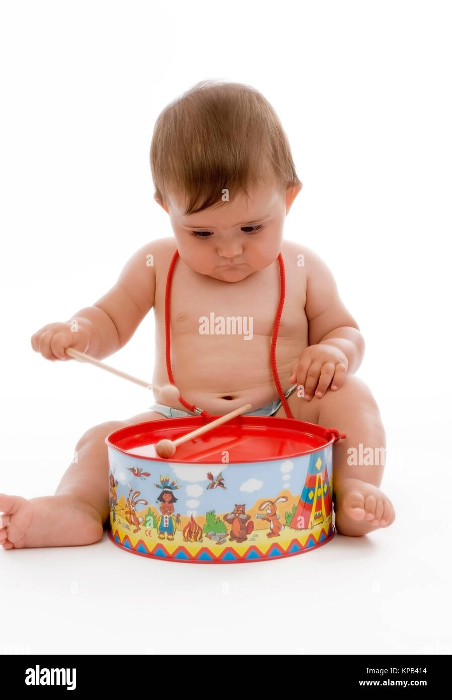 Model release, Kleinkind, 8 Monate, mit Kindertrommel - little child with toy drums Stock Photo