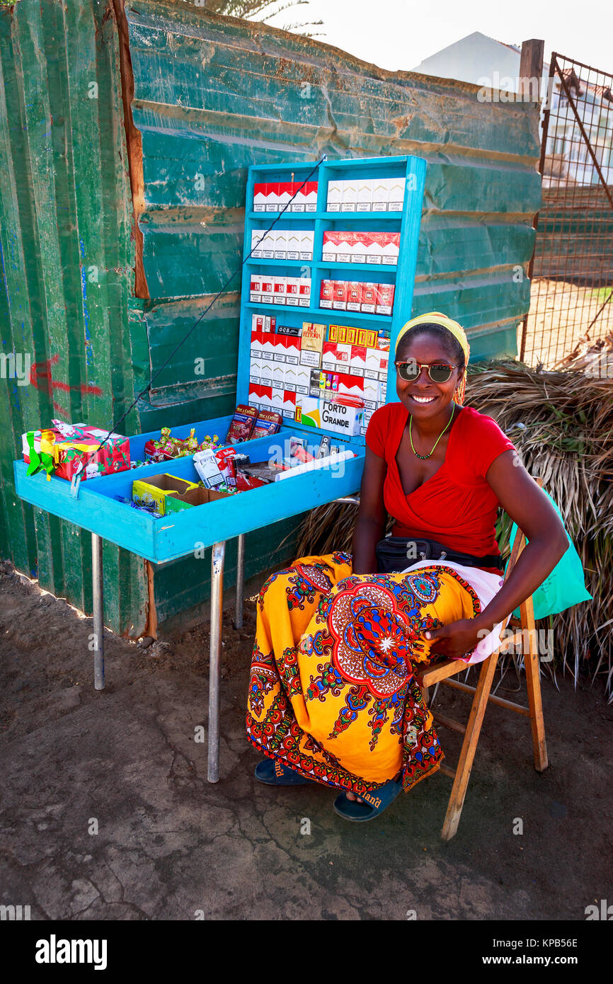 selling cigarettes Woman selling cigarettes and tobacco from a stall on a street corner, Santa  Maria, Sal, Salina, Cape Verde, Africa Stock Photo