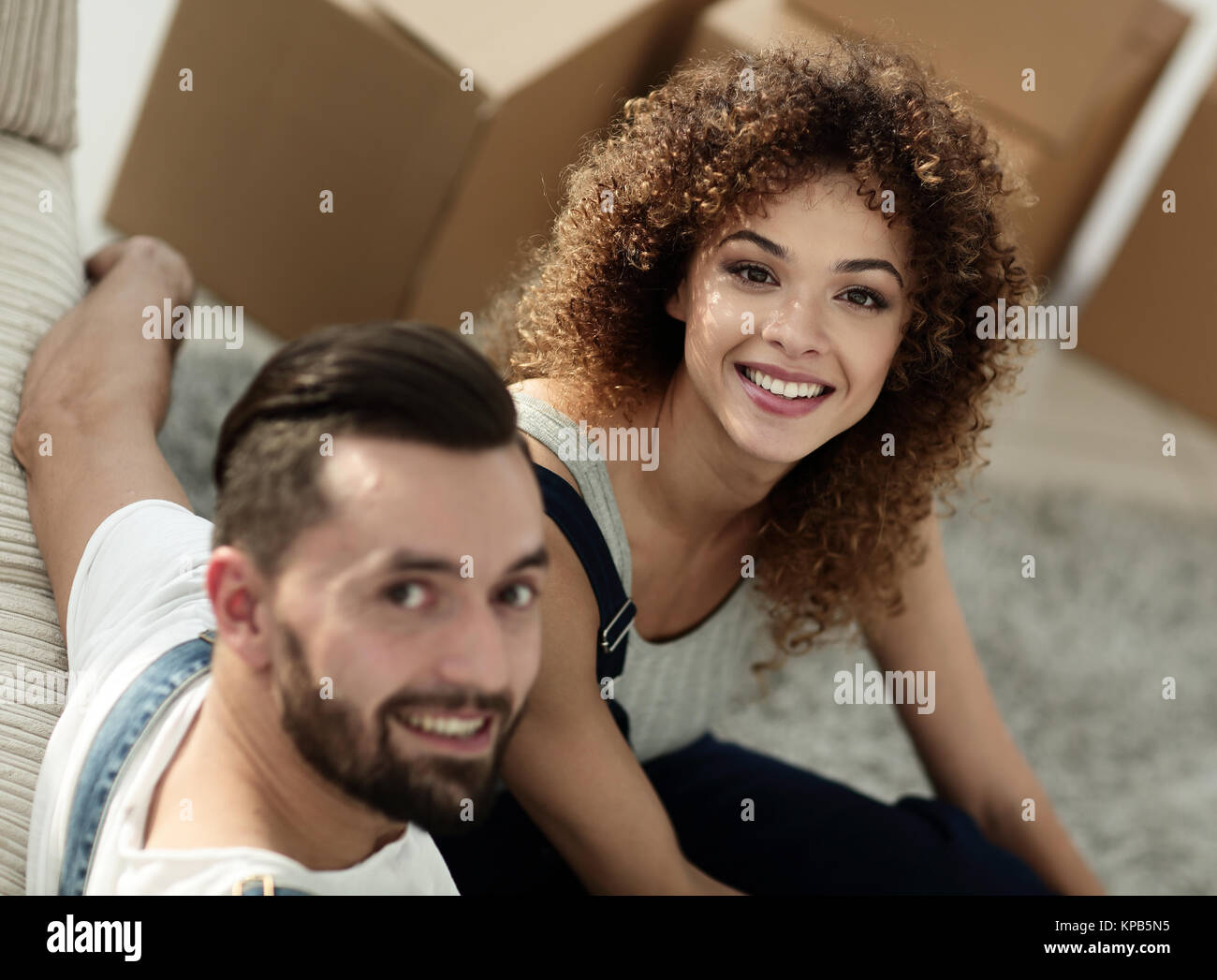 Happy young couple in a new apartment Stock Photo - Alamy
