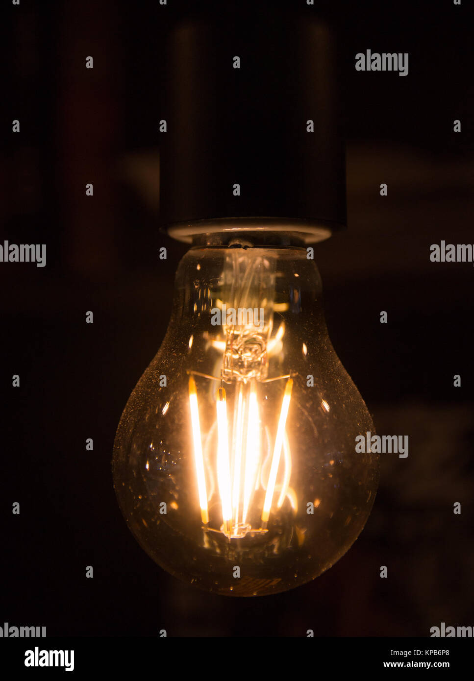 Light bulb on black background Stock Photo Alamy
