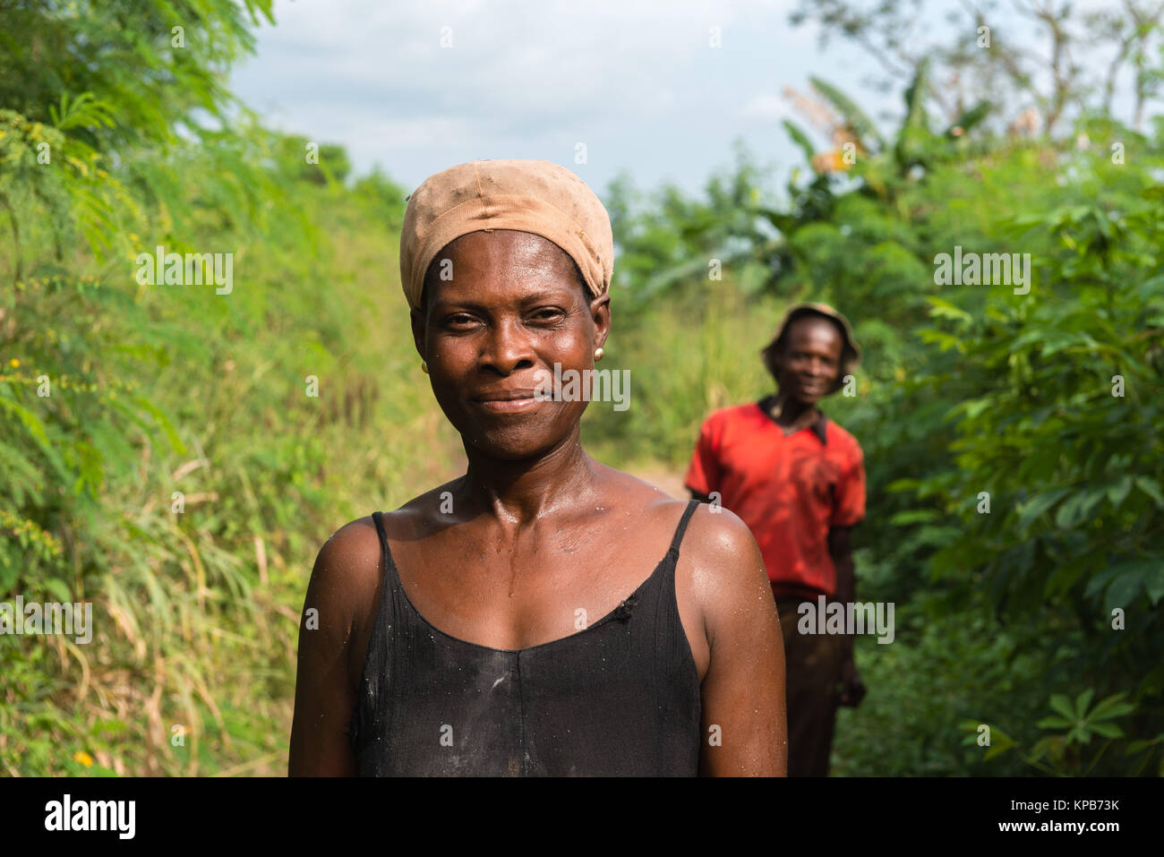 Portrait of a woman farmhand in the fields, village near Mafi-Kumase Proper, Volta Region, Ghana, Africa Stock Photo