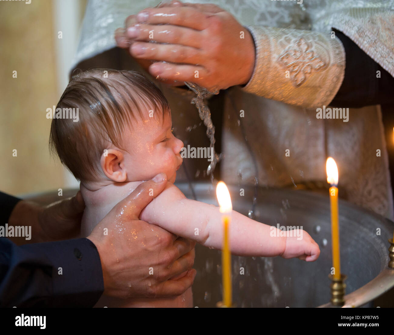 Belarus, the city of Gomel, the St. Nicholas Monastery,11.06.2016.The rite of Orthodox baptism. . Baptism of the newborn Stock Photo