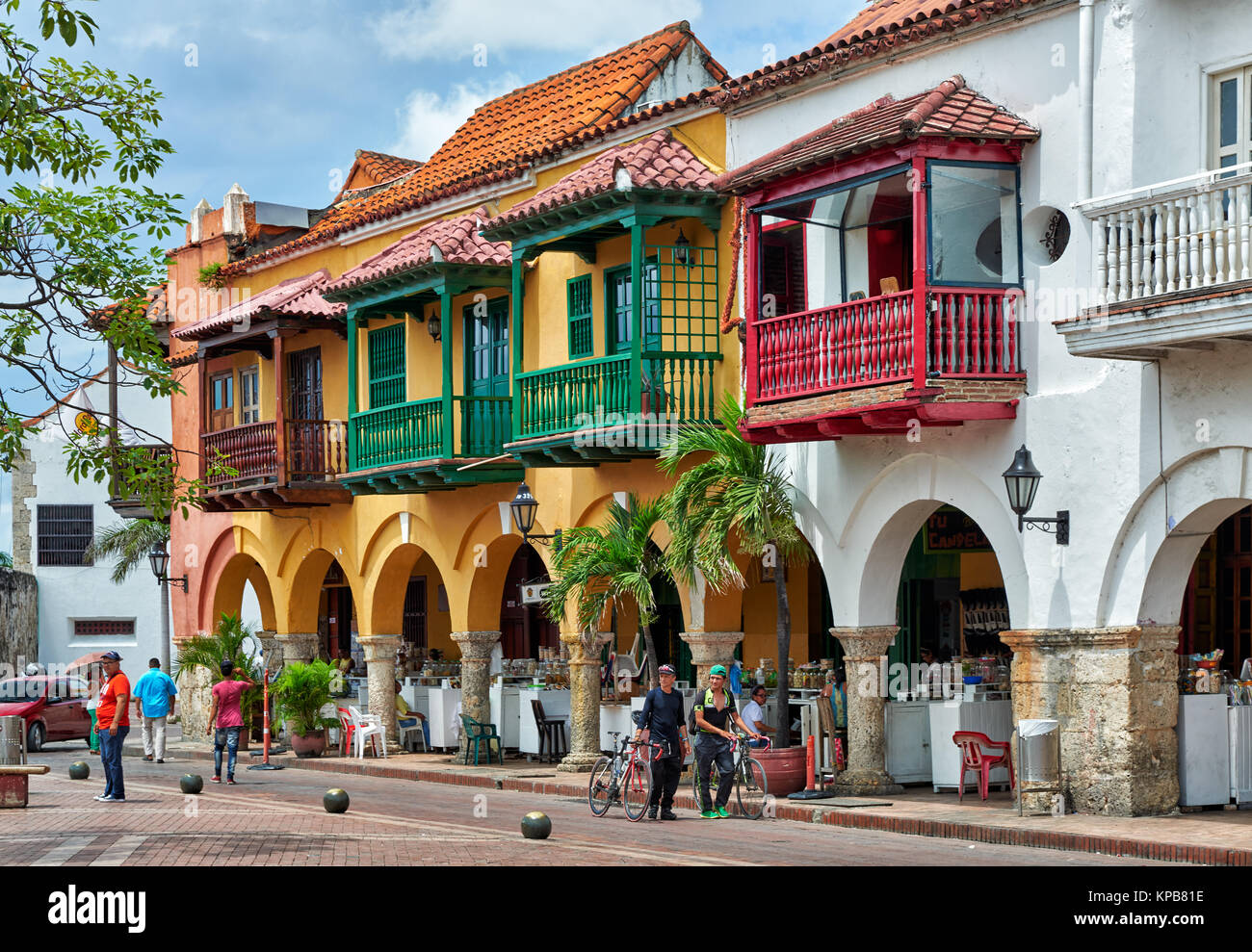 typical colorful facades with balconys of houses at Plaza de Los Coches, Cartagena de Indias, Colombia, South America Stock Photo