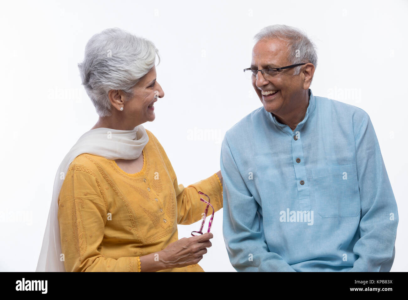 Senior couple looking at each other and talking Stock Photo