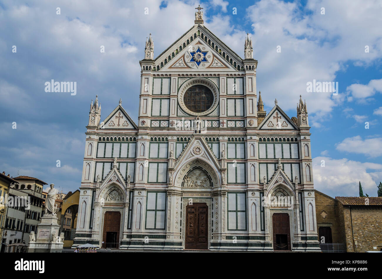 foreground of the facade of the basilica of the cross in Renaissance style and on the left you can see a statue of Dante Aliguieri his body rests insi Stock Photo