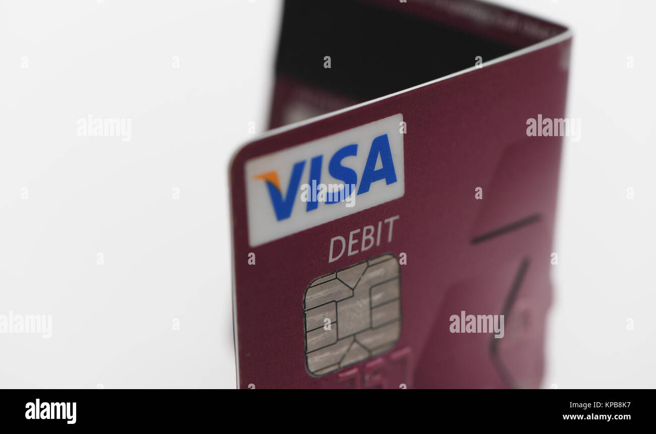 A folded Visa  debit card from Nat West on white background. Stock Photo