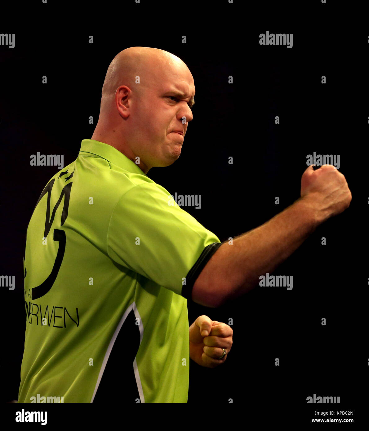 Micheal van Gerwen celebrates winning his match during day one of the