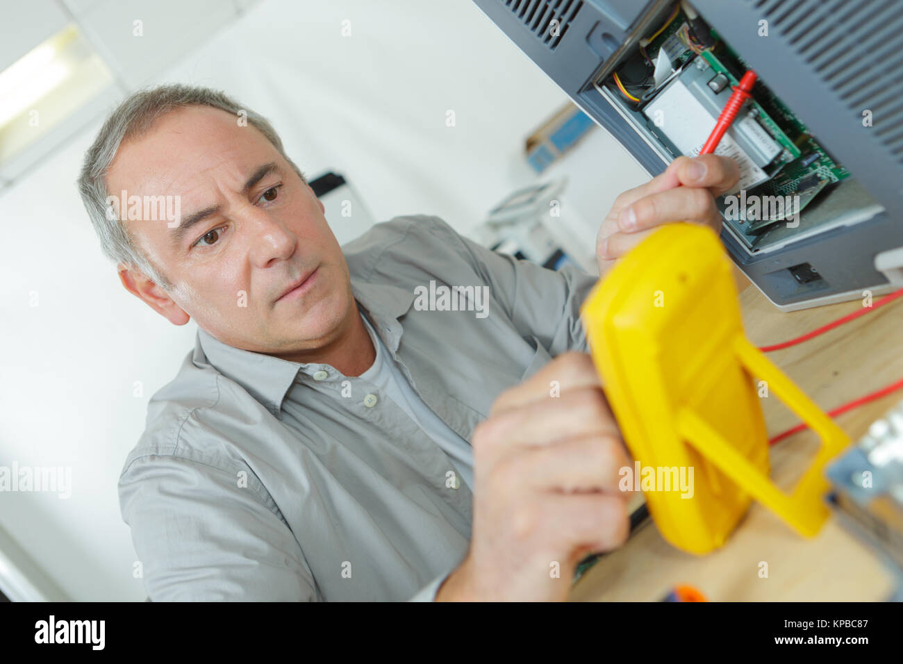 electrician testing industrial machine Stock Photo Alamy