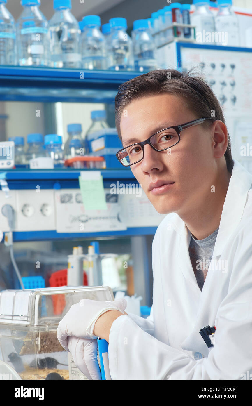 Portrait of a young male scientist, tech or graduate student in biological or chemical research facility or scientific laboratory Stock Photo