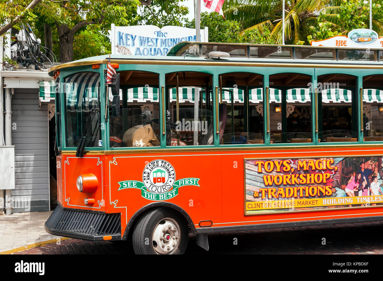 Old Town Trolley Tour Bus beside Key West Municipal Aquarium, Key West