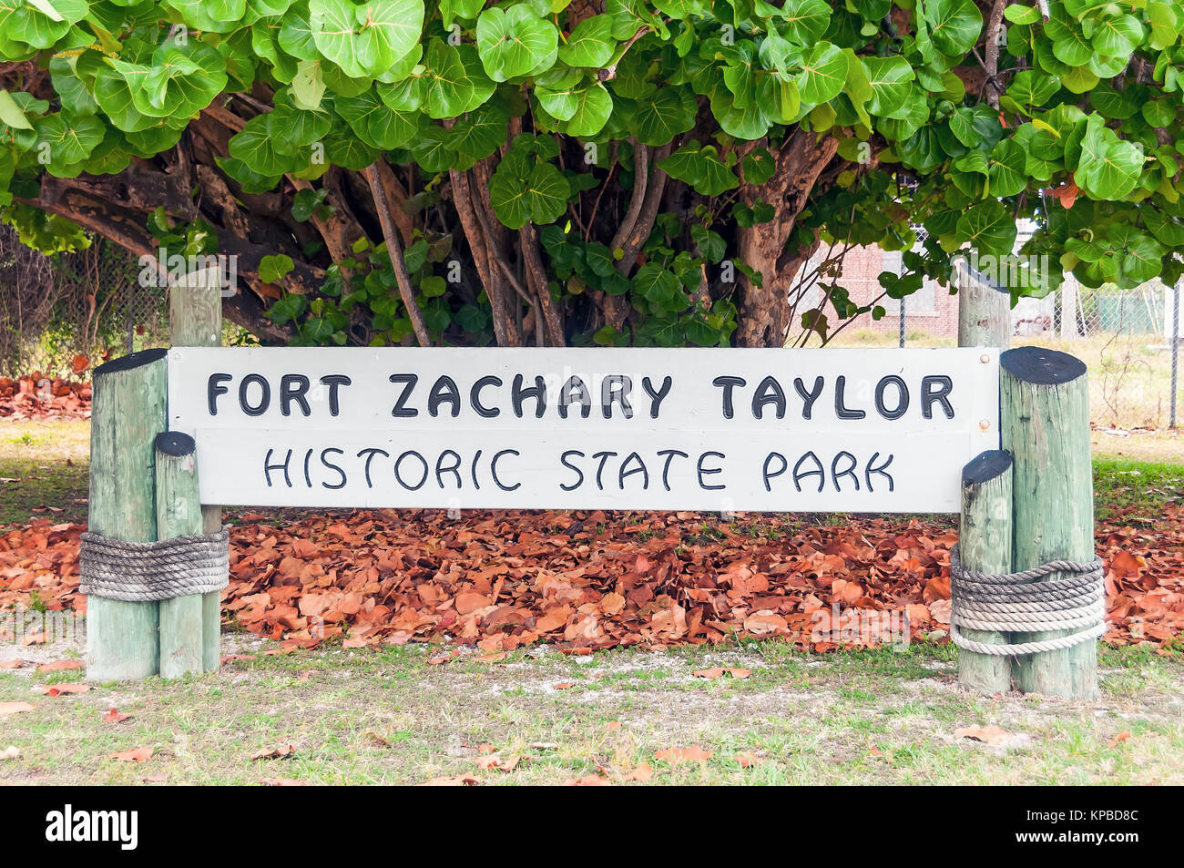 Fort Zachary Taylor Historic State Park sign benath seagrape tree, Key West, Florida Stock Photo