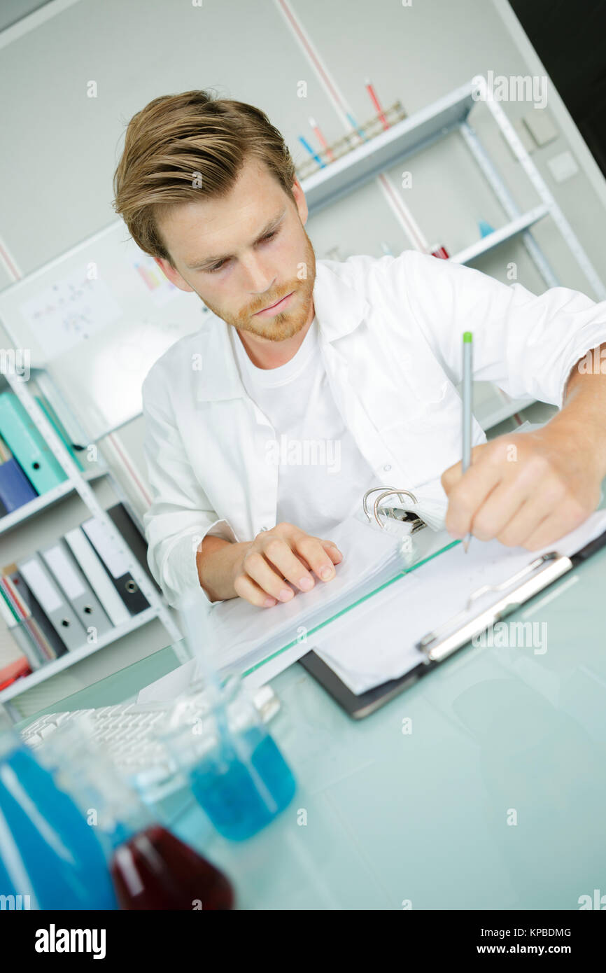 Young scientist in white hi-res stock photography and images - Alamy