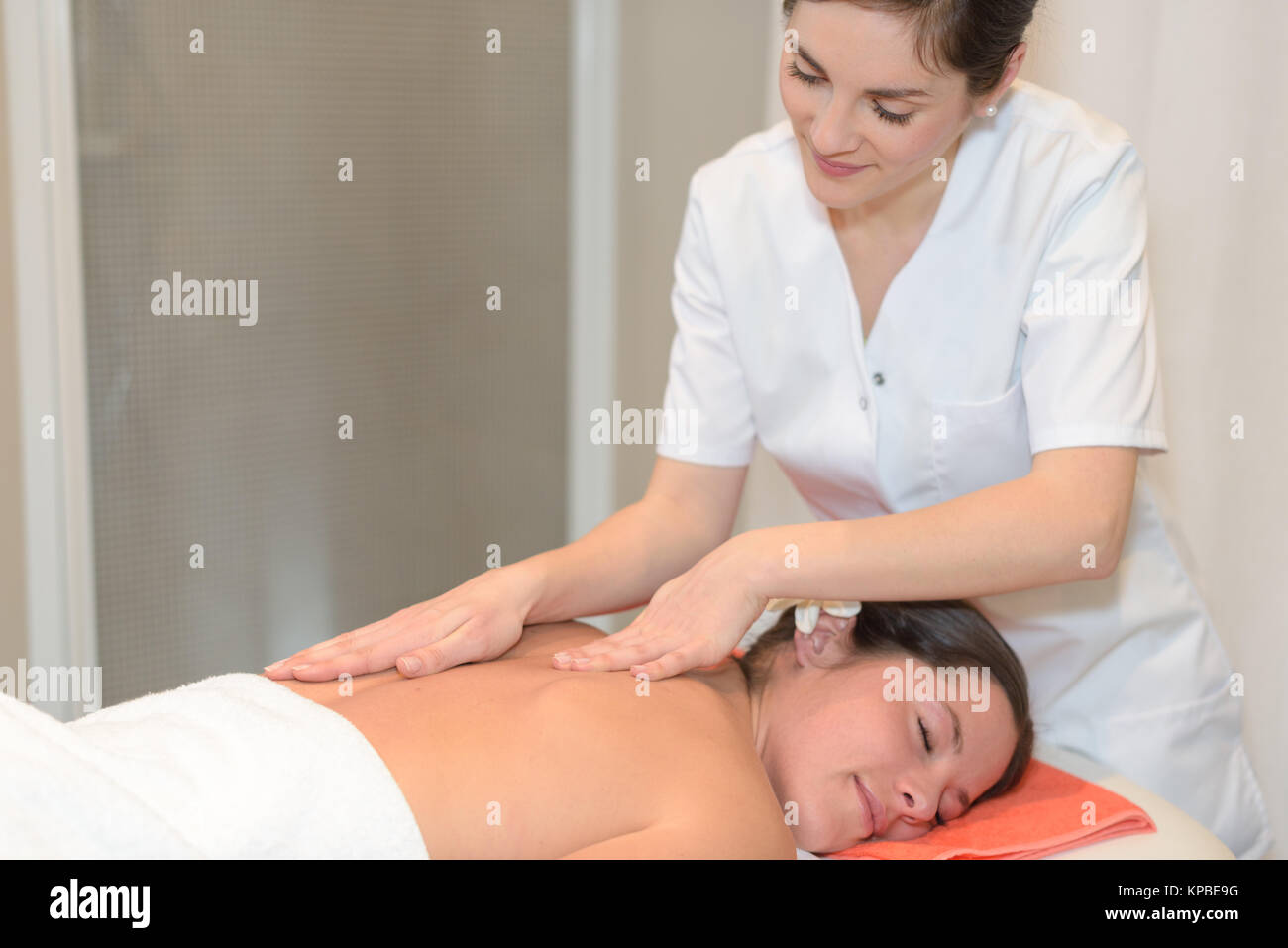 young woman at spa massage Stock Photo
