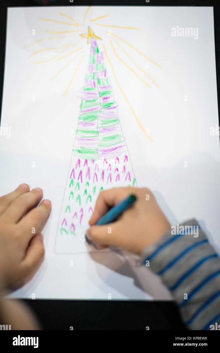 Child Writes Letter To Santa And Draw A Christmas Tree Stock