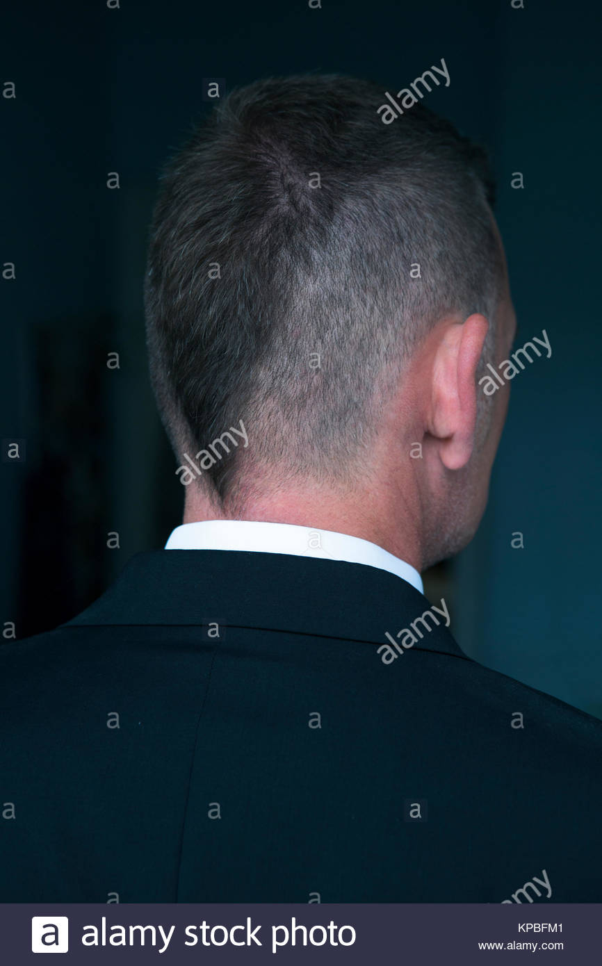 Backside Of Businessman With Hipster Haircut Stock Photo