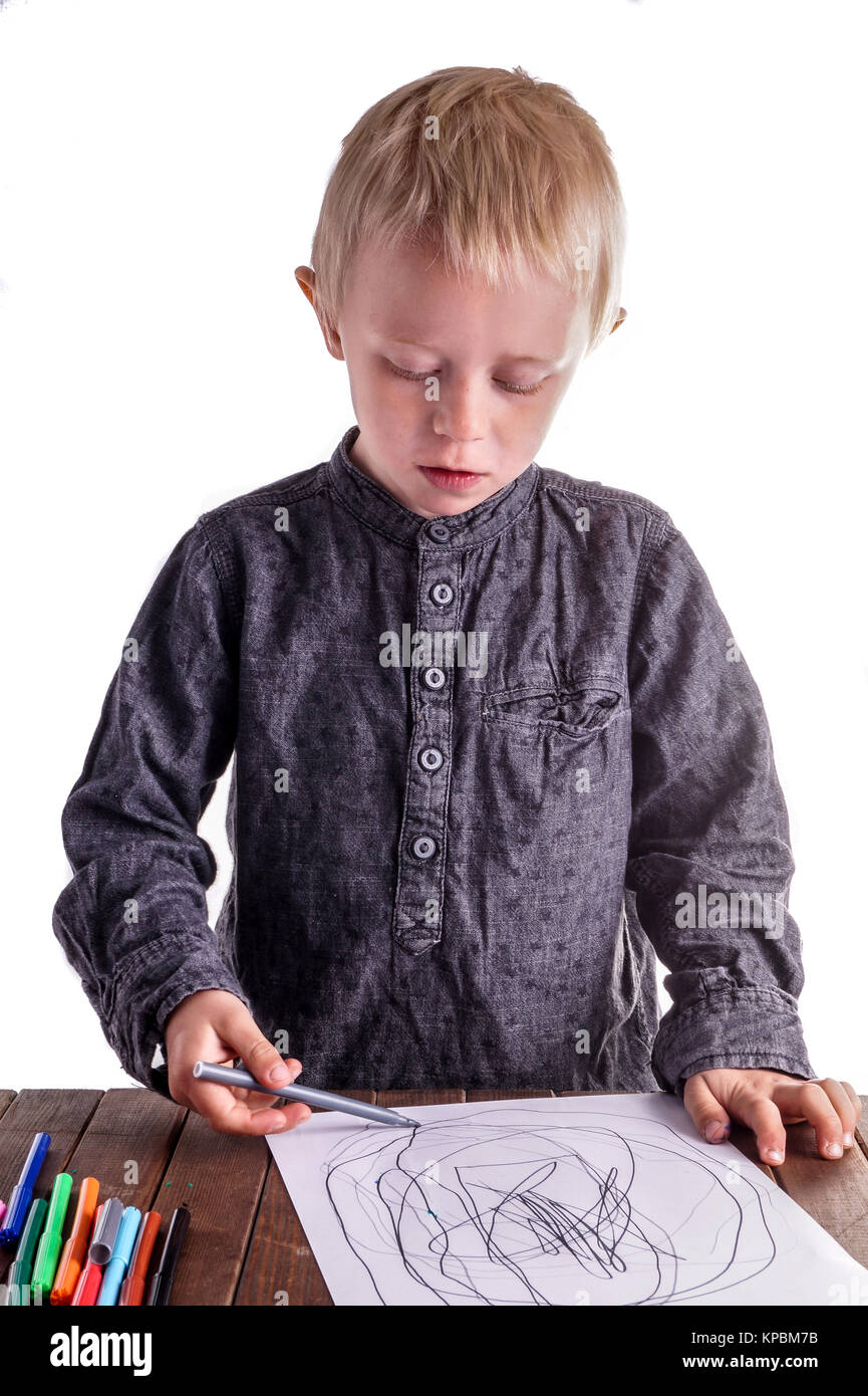 Little boy draws a drawing Stock Photo - Alamy