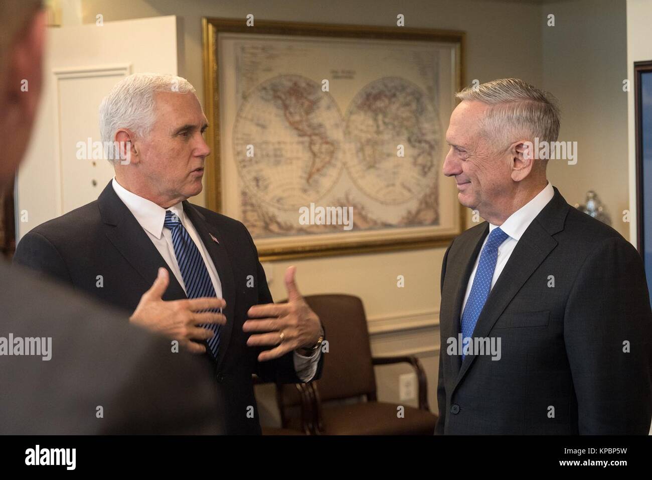 U.S. Vice President Mike Pence (left) and U.S. Defense Secretary James Mattis arrive at the Pentagon for the U.S. Naval Academy pep rally December 7, 2017 in Washington, DC. Stock Photo