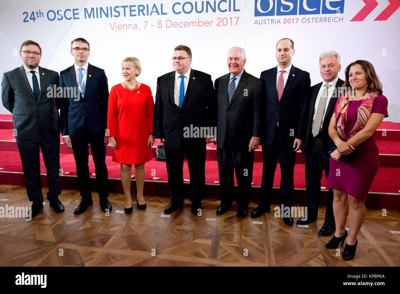 U.S. Secretary of State Rex Tillerson (center) poses with Friends of Georgia Group at the Organization for Security and Co-operation in Europe (OSCE) Ministerial Council December 7, 2017 in Vienna, Austria. Stock Photo