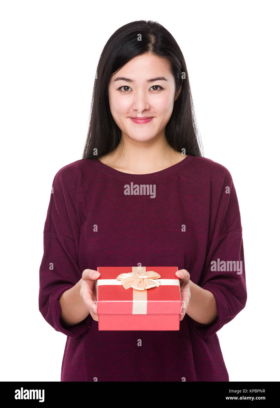 Woman holding a gift box Stock Photo - Alamy