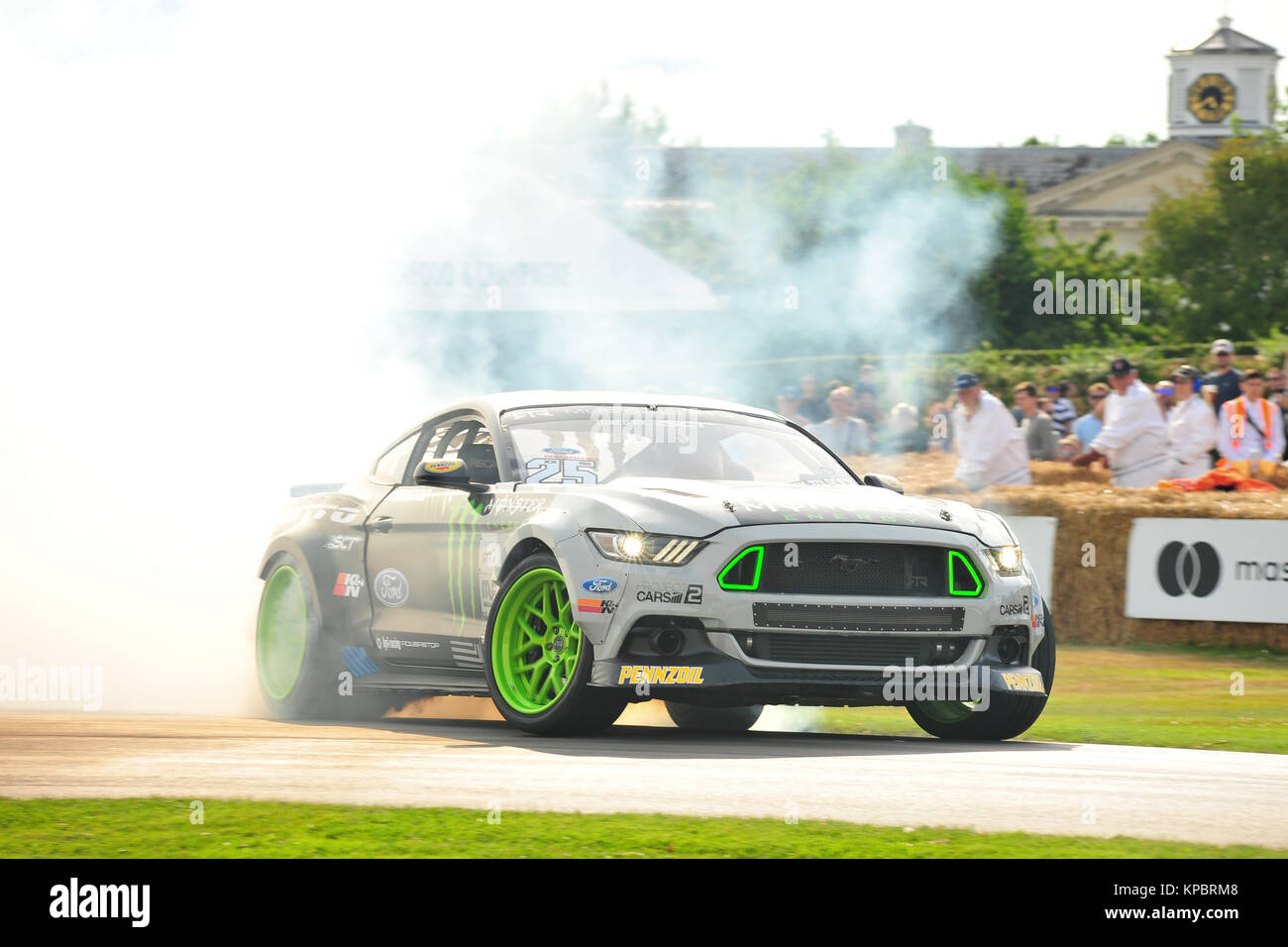 A car performing a burn out at the 2017 Goodwood Festival of Speed. Stock Photo