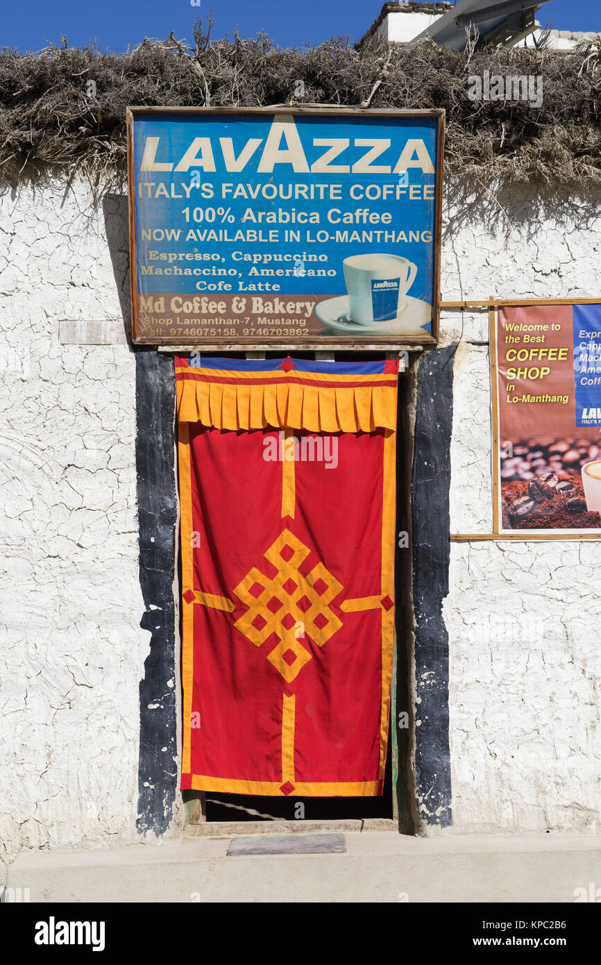 Entrance of a coffee shop in Lo Manthang, Upper Mustang region, Nepal. Stock Photo